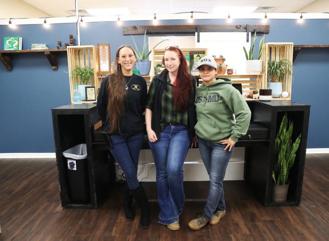Herbal Alchemy LLC is set to be the first medical cannabis dispensary in North Mississippi. On Jan 10, 2023, we were given an inside look before they start selling.(left to right) Store Manager Brier Brummett, owner Elizabeth Barnett, and owner Sarah Kalkstein pose in front of counter in their store.